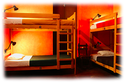Bed in Shared Room<br><br>4, 6 or 10-beds dormitories.<br><br><small>Includes breakfast personal lamps, personal security lockers, a mirror, a fan, towels, sheets, pillows and extra blankets.<br>(Click on the picture)</small>